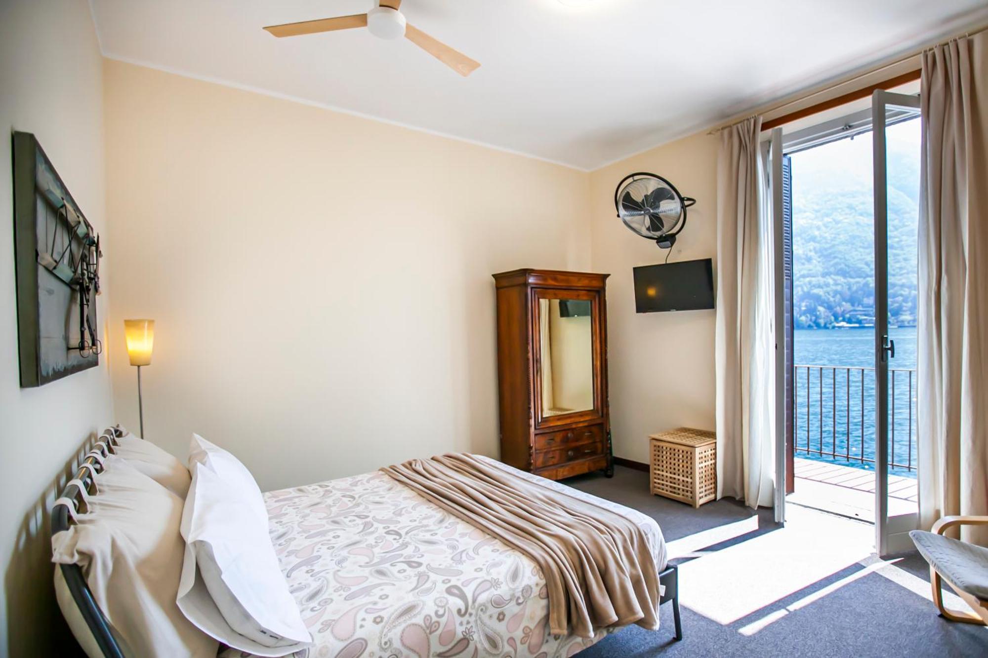 Darsena Di Riva Grande Hotel Moltrasio Bagian luar foto